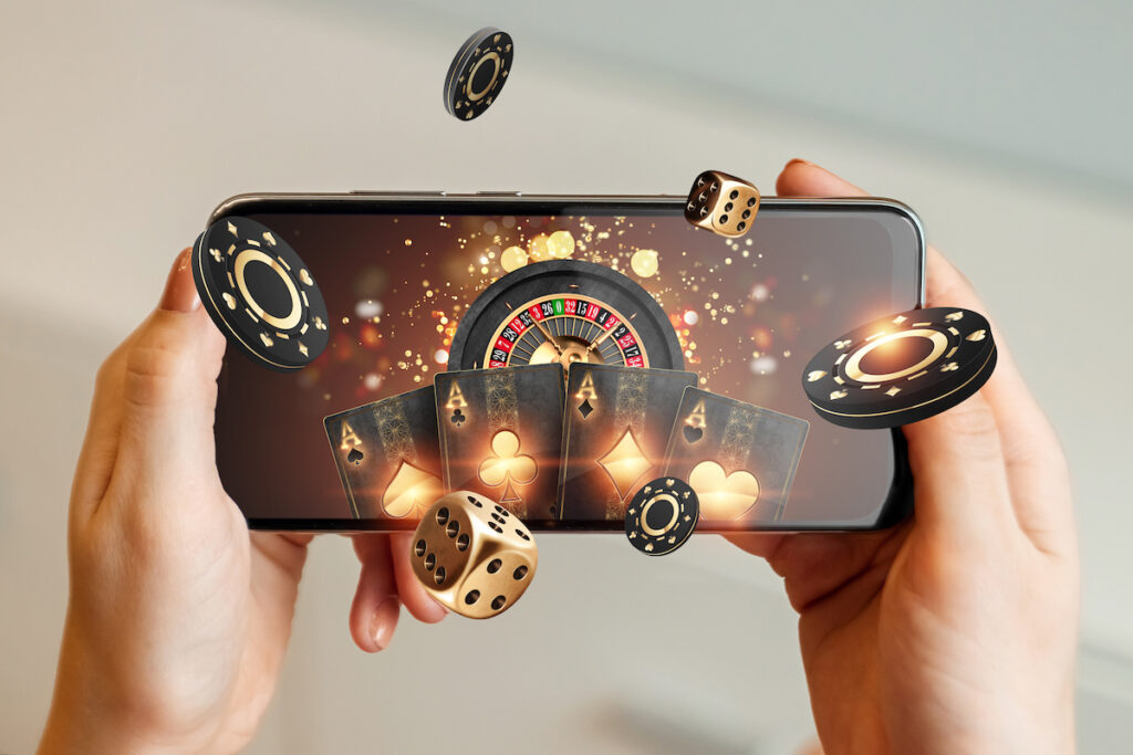 online casino, in a man's hand a smartphone